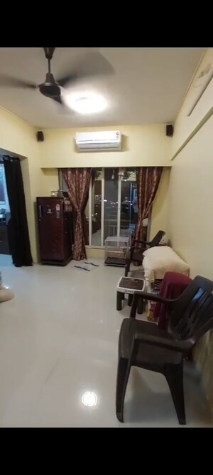 Living Room in 1 BHK Apartment at Vinay Nagar CHS, Mira Road – for Sale