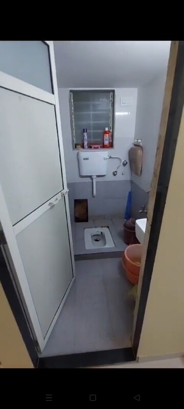 Bathroom in 1 BHK Apartment at Vinay Nagar CHS, Mira Road – for Sale