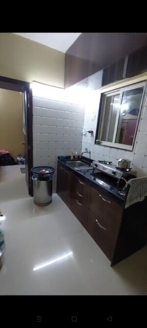 Living Room in 1 BHK Apartment at Vinay Nagar CHS, Mira Road – for Sale