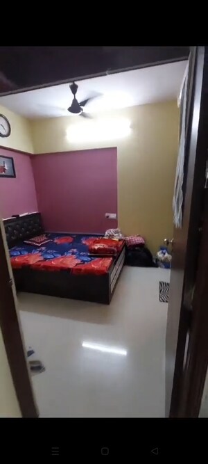 Bedroom in 1 BHK Apartment at Vinay Nagar CHS, Mira Road – for Sale