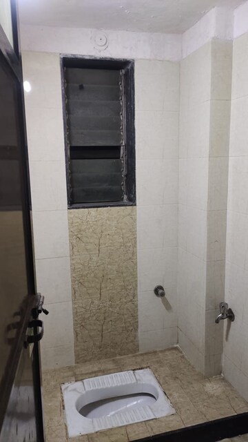 Bathroom in 1 BHK Apartment at Matoshree Park, Bhandup East – for Rent