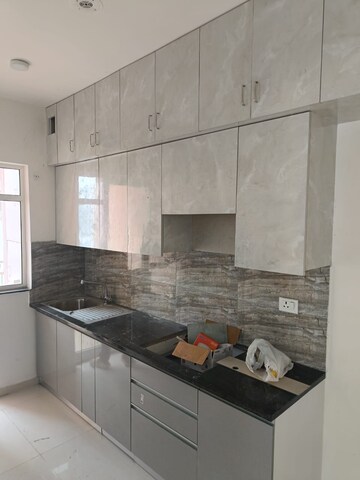 Kitchen in 2 BHK Apartment at Shapoorji Pallonji Joyville Phase 2, Sector 102 – for Rent