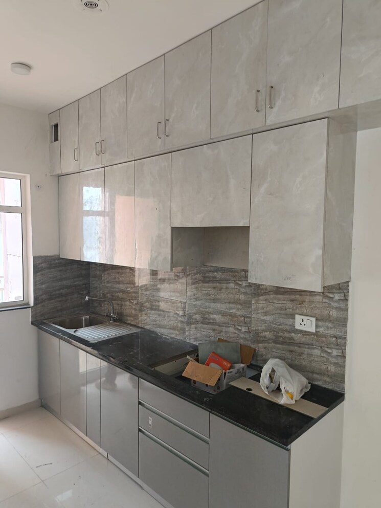 Kitchen, shapoorji-pallonji-joyville-phase-2 2 Bedroom 915 Sq.Ft. Apartment In Sector 102 Gurgaon 9075635