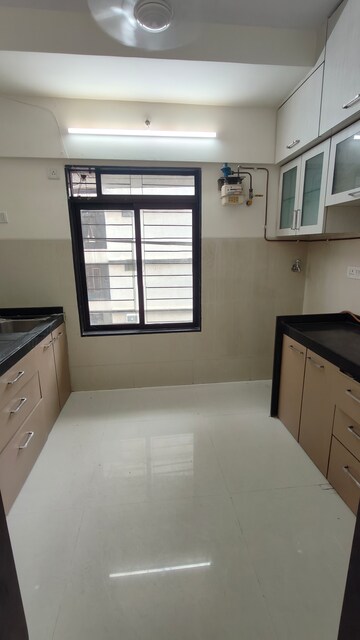 Kitchen in 2 BHK Apartment at Acme Stadium View, Andheri West – for Rent