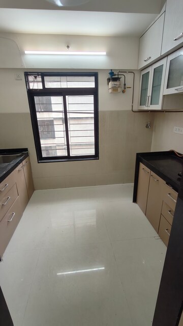 Kitchen in 2 BHK Apartment at Acme Stadium View, Andheri West – for Rent