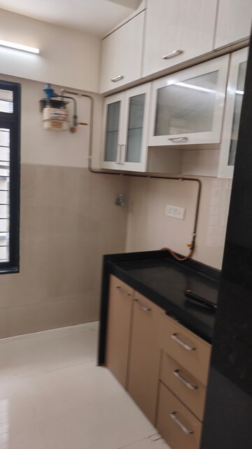 Kitchen in 2 BHK Apartment at Acme Stadium View, Andheri West – for Rent