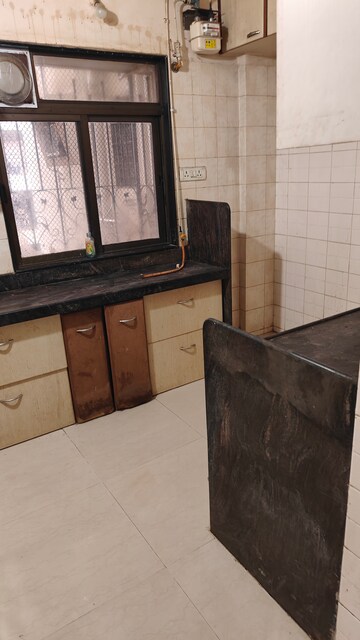 Kitchen in 2 BHK Apartment at Prathamesh Krupa Kedar Darshan, Andheri West – for Rent