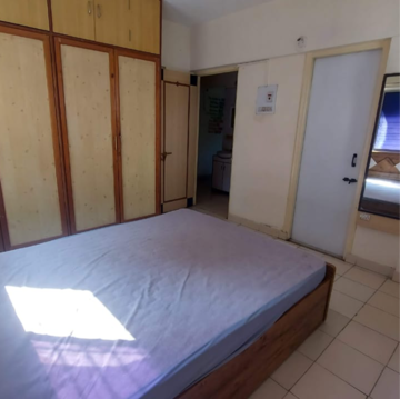 Bedroom in 2 BHK Apartment at Nirmiti Primrose, Baner – for Rent