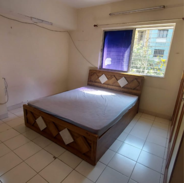 Bedroom in 2 BHK Apartment at Nirmiti Primrose, Baner – for Rent