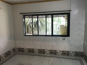 Room in 2 BHK Apartment at NG Garden, Kandivali West – for Sale