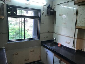 Kitchen in 2 BHK Apartment at NG Garden, Kandivali West – for Sale