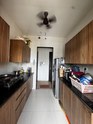 Kitchen in 1 BHK Apartment at Raunak Heights, Ghodbunder Road – for Rent