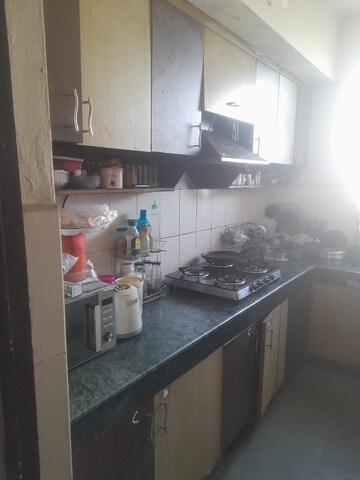 Kitchen in 3 BHK Apartment at Dwarka Sector 18b – for Rent