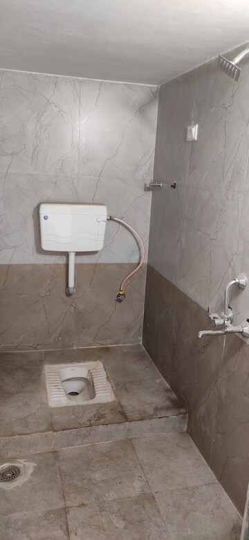 Bathroom in 2 BHK Apartment at Mahad – for Rent