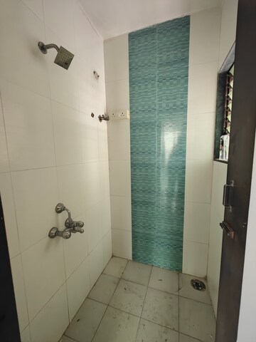 Bathroom in 1 BHK Apartment at Sadbhavana Palm Exotica, Seawoods Sector 50 – for Rent
