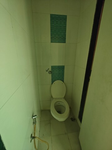 Bathroom in 1 BHK Apartment at Sadbhavana Palm Exotica, Seawoods Sector 50 – for Rent