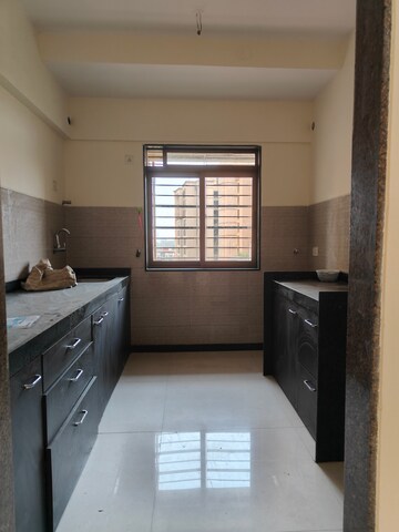 Kitchen in 2 BHK Apartment at Acme Ozone, Manpada – for Rent