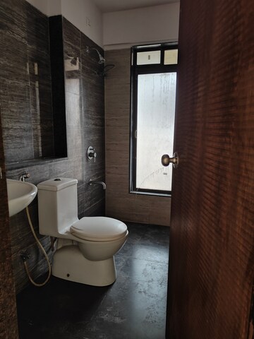 Bathroom in 2 BHK Apartment at Acme Ozone, Manpada – for Rent