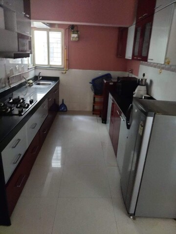Kitchen in 2 BHK Apartment at Mirchandani Palms, Rahatani – for Rent