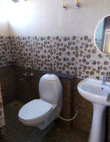 Bathroom in 3 BHK Apartment at AH Galaxy, Hbr Layout – for Rent