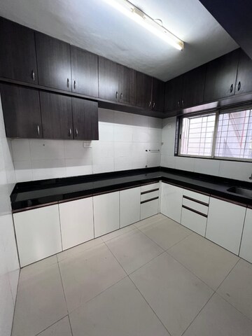 Kitchen in 2 BHK Apartment at Gulmohar Paradise, Viman Nagar – for Rent