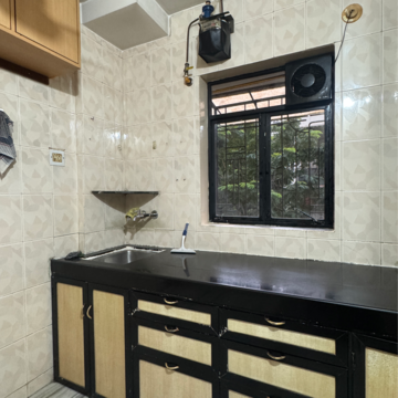 Kitchen in 1 BHK Apartment at Milan Park CHS, Ramchandra Nagar – for Rent