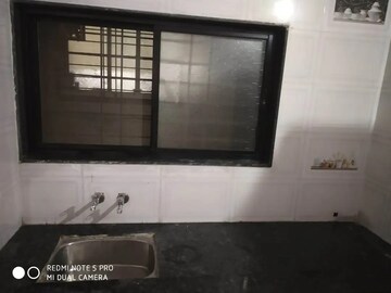 Kitchen in 1 BHK Apartment at Rupali Palace, Wadgaon Sheri – for Rent