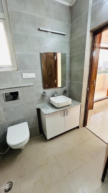 Bathroom in 4 BHK Apartment at The 4 Aces CHS, Sector 27 – for Rent