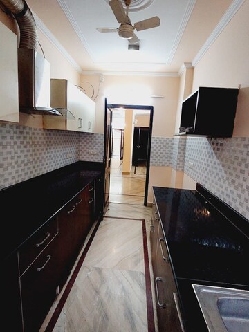 Kitchen in 3 BHK Builder Floor at Boutique Residential Apartments A-10, Gulmohar Park – for Rent