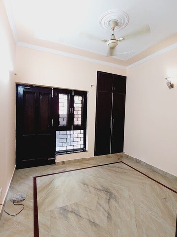 Bedroom in 3 BHK Builder Floor at Boutique Residential Apartments A-10, Gulmohar Park – for Rent