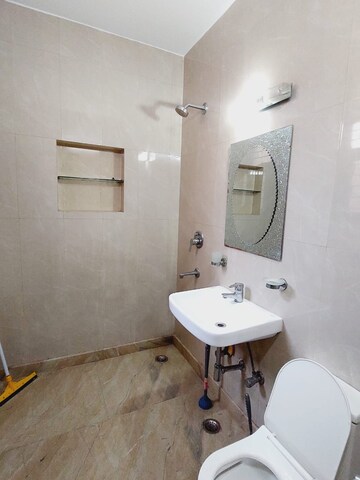 Bathroom in 3 BHK Builder Floor at Boutique Residential Apartments A-10, Gulmohar Park – for Rent