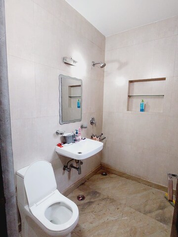 Bathroom in 3 BHK Builder Floor at Boutique Residential Apartments A-10, Gulmohar Park – for Rent