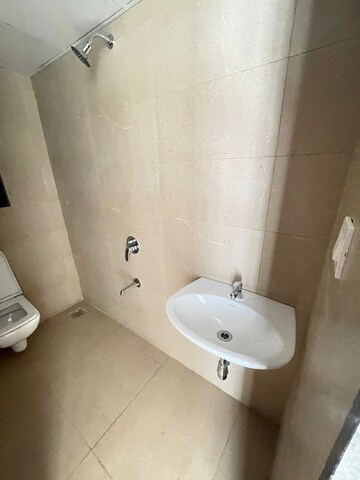 Bathroom in 2 BHK Apartment at Runwal Eirene, Balkum Pada – for Rent