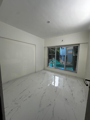 Room in 2 BHK Apartment at Shiv Guru Ashish, Mulund East – for Sale