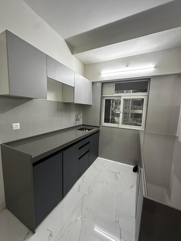 Kitchen, shiv-guru-ashish 2 Bedroom 696 Sq.Ft. Apartment In Mulund East Mumbai 9076453