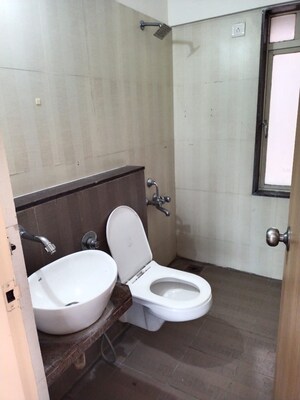 Bathroom in 1 BHK Apartment at Vihang Valley Phase 2, Kasarvadavali – for Sale
