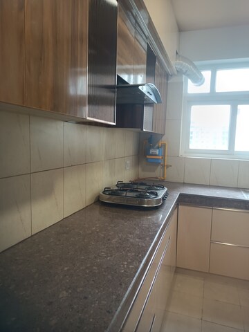 Kitchen in 4 BHK Apartment at 3C Lotus Panache, Sector 110 – for Rent