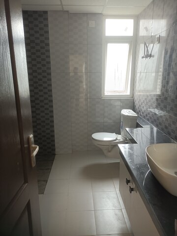 Bathroom in 4 BHK Apartment at 3C Lotus Panache, Sector 110 – for Rent