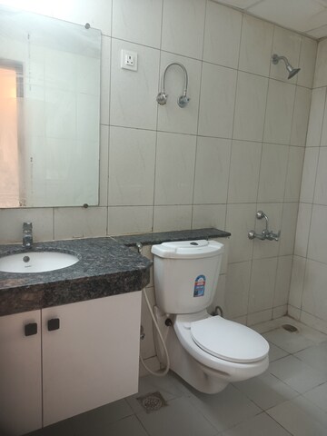 Bathroom in 4 BHK Apartment at 3C Lotus Panache, Sector 110 – for Rent