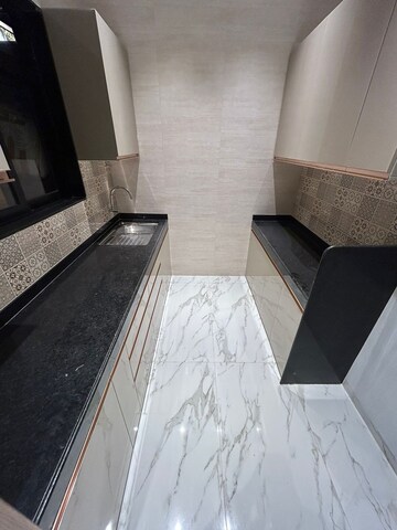 Kitchen in 2 BHK Apartment at The Baya Sunrise, Dadar East – for Sale