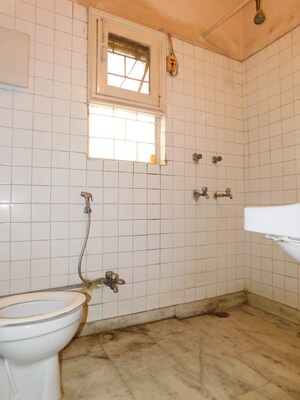 Bathroom in 3 BHK Builder Floor at Sukhdev Vihar – for Sale