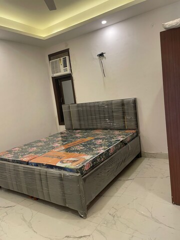 Bedroom in 2 BHK Builder Floor at Freedom Fighters Enclave – for Rent