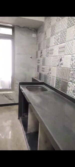 Kitchen in 6+ BHK Apartment at Oberoi Sky City Tower E, Borivali East – for Sale