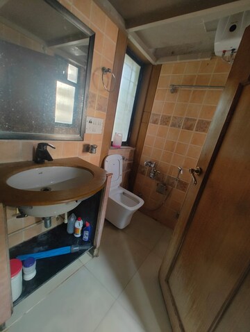 Bathroom in 2 BHK Apartment at Joshi Amar Vaishali CHS, Naupada – for Rent