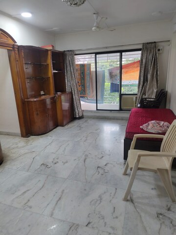 Living Room in 2 BHK Apartment at Joshi Amar Vaishali CHS, Naupada – for Rent