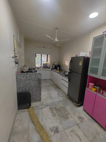 Kitchen in 2 BHK Apartment at Joshi Amar Vaishali CHS, Naupada – for Rent