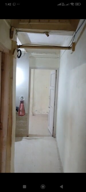 Building Lobby in 1 BHK Apartment at Harsha Ratan CHS, Borivali East – for Sale