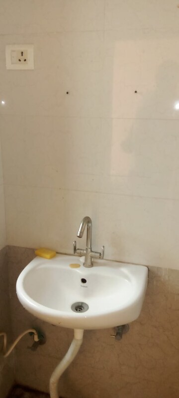 Bathroom in 2 BHK Apartment at Milan Earth, Raj Nagar Extension – for Rent