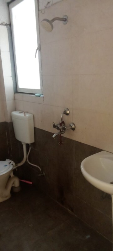 Bathroom in 2 BHK Apartment at Milan Earth, Raj Nagar Extension – for Rent