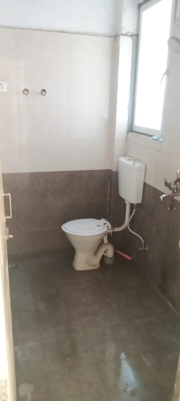 Bathroom in 2 BHK Apartment at Milan Earth, Raj Nagar Extension – for Rent
